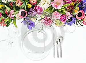 Table decoration spring flowers place settingwhite background