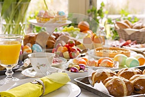 Table with delicatessen ready for Easter brunch