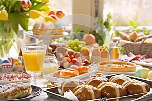 Table with delicatessen ready for Easter brunch photo