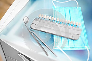 Table with dental instruments in modern clinic