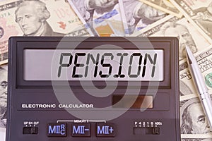 On the table are dollars and a calculator on the electronic board which says PENSION