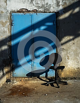 A table and a door. Industrial scene.