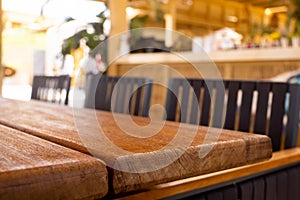 Table empty background in cafe ,restaurant background.Front view. . Dining table. Brochure background.Bar outside in
