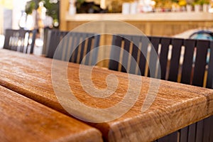 Table empty background in cafe ,restaurant background.Front view. . Dining table. Brochure background.Bar outside in