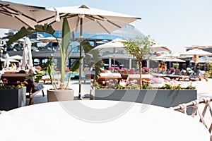 Table empty background in outdoor cafe , modern restaurant background.Front view. . Dining table. Brochure background