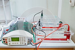 Table with equipment for gel electrophoresis at Biochemical laboratory