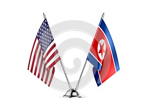 Table flags, United States America and North Korea, isolated on white background. 3d image