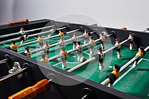 Table football. Close-up image of plastic players in a football game