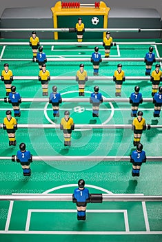 Table football with players and numbered shirts