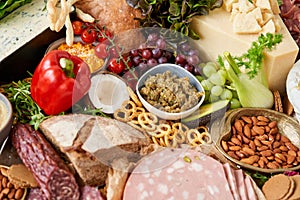 Table full of mediterranean appetizers, tapas or antipasto. Assorted Italian food set. Delicious snack on party or