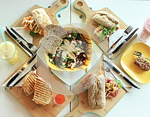 Photo of brunch/ lunch with salad and sandwiches photo