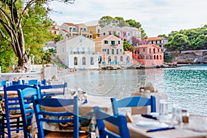 Table in Greek tavern in Assos fishing village, Kefalonia island, Greece