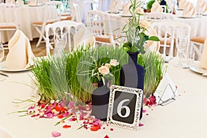 Table for guests in the wedding hall.