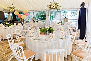 Table for guests in the wedding hall.