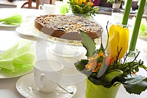 Table laid for coffee and cake photo