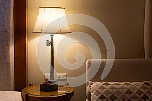 table lamp on bedside in bedroom