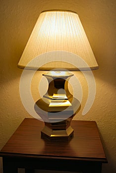 Table lamp on bedside table