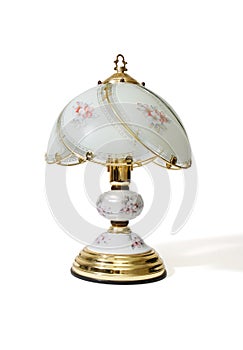 Table lamp under the lampshade with flower pattern photo
