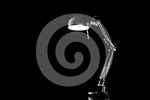 Table light furniture decor. Modern home lamp on office desk isolated on black background.