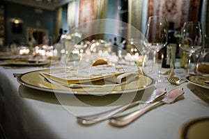 table in a luxury restaurant, set for a gala dinner