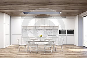 Table in a marble kitchen