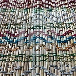 Table Mat made of Calamus Tenius and colorful Threads