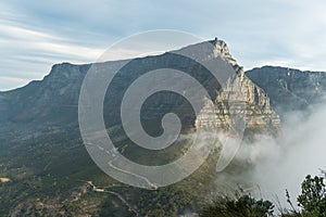 Table Mountain in Cape Town South Africa with clouds in the forground captured from Lions Head