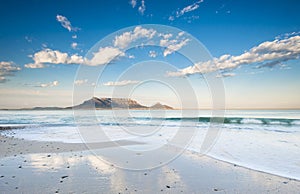 Table Mountain with clouds and wave