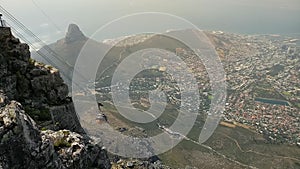 Table Mountain  is a landmark overlooking the city of Cape Town in South Africa