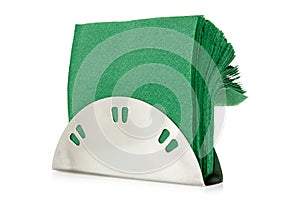Table napkin holder with green napkins
