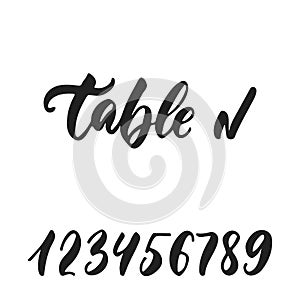 Table number - hand drawn wedding romantic lettering phrase isolated on the white background. Fun brush ink vector