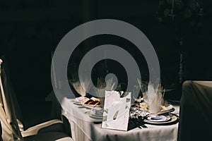 Table number seven. Interior of restaurant for wedding dinner, ready for guests