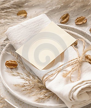 Table place with Blank paper card and bohemian decorations