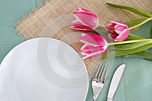 Table place setting with flowers