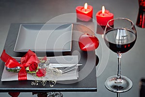 Table place setting with holidays decoration.