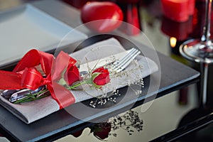 Table place setting with holidays decoration.