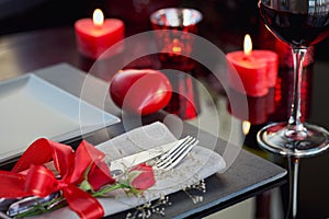 Table place setting with holidays decoration.