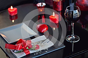 Table place setting with holidays decoration.