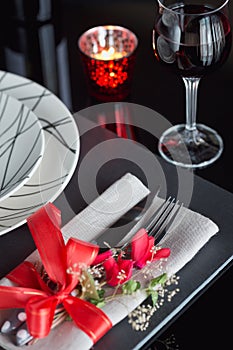 Table place setting with holidays decoration.