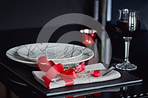 Table place setting with holidays decoration.