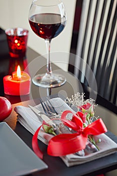 Table place setting with holidays decoration.