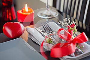 Table place setting with holidays decoration.