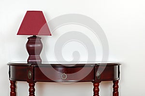 Table with red lamp photo