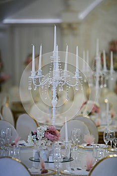 Table in a restaurant with flowers and candles