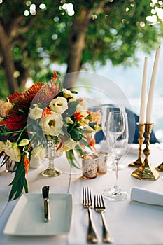 A table in a restaurant near the sea