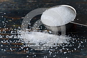 Table Salt Spilled from a Teaspoon