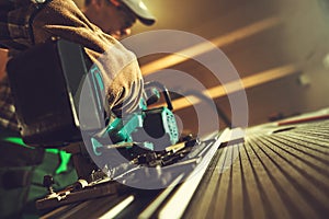 Table Saw Rail in Use by Construction Woodwork Worker