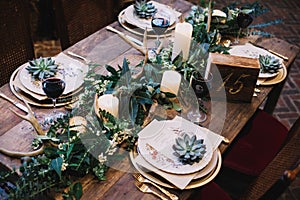 A table scape designed for a boho style event with rustic touches