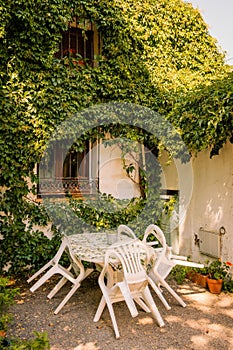 Table and seats and garden view