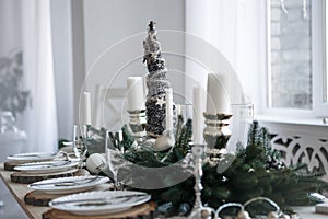 Table served for Christmas dinner in living room